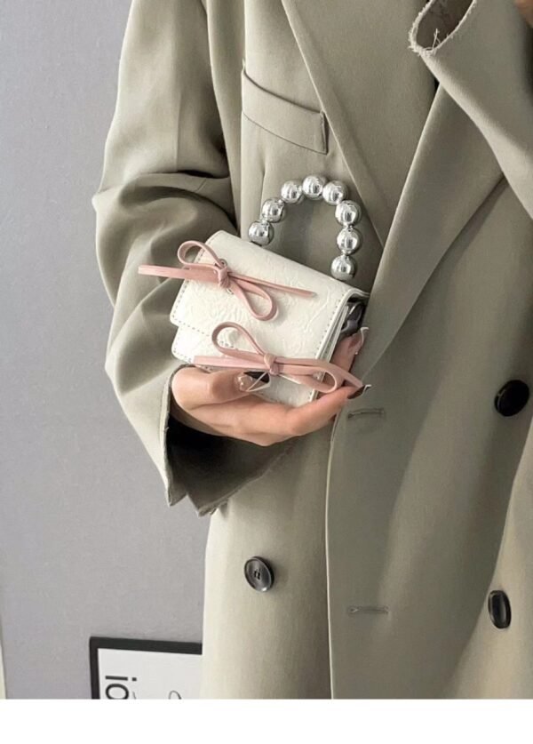 Textured Cute Bow Mini Chain Handbag - Image 9